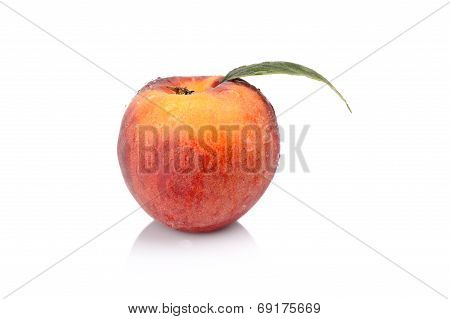 Studio Shot Of Whole Fresh Peach Isolated On A White Background