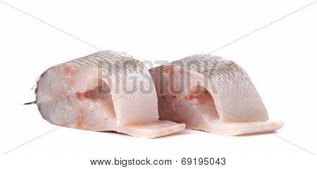 Two fresh steaks of seabass.