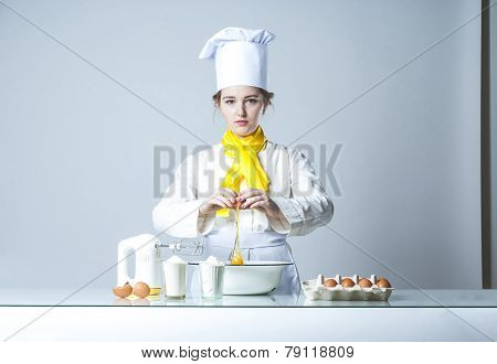Cook Breaking Egg