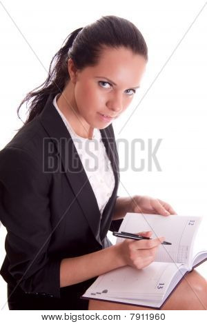 ผู้หญิงที่ มีปากกาและ Datebook