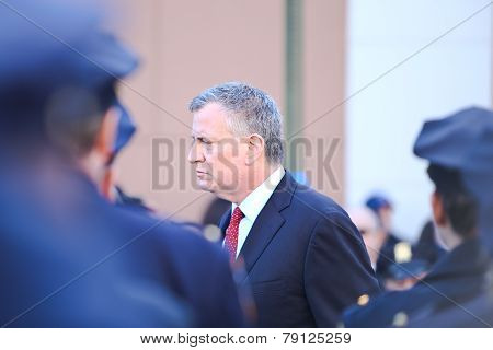 Mayor Bill De Blasio files past NYPD