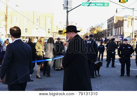 Timothy Cardinal Dolan leaves church