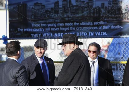 Timothy Cardinal Dolan leaving church