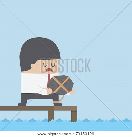 Desperate Businessman Holding The Rock And Dicide To Commit Suicide