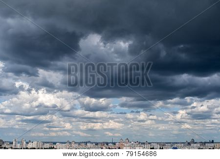 Dramatic afternoon cloudscape before rain stormy massive clouds