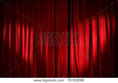 Part of a red curtain.