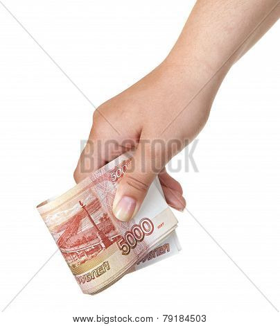 Stack of five thousandth bills in the female hand.