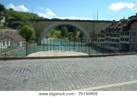 Bridge On Aare River And Buildings In Bern, Switzerland