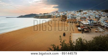 Panorama of Albufeira town and empty beach in Portugal in the evening