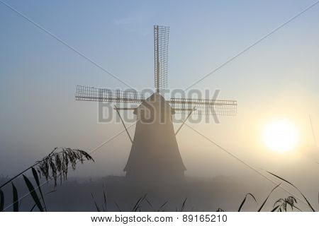 windmill in the mist