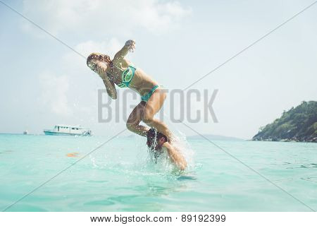 Playful Couple In The Water