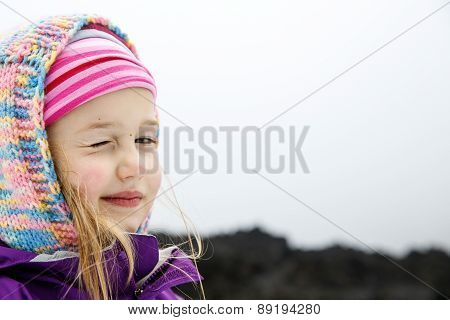 Portrait Of Playful And Carefree Caucasian Girl