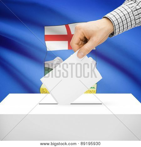 Voting Concept - Ballot Box With National Flag On Background - Alberta