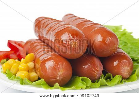 Close up of sausage and fresh vegetables