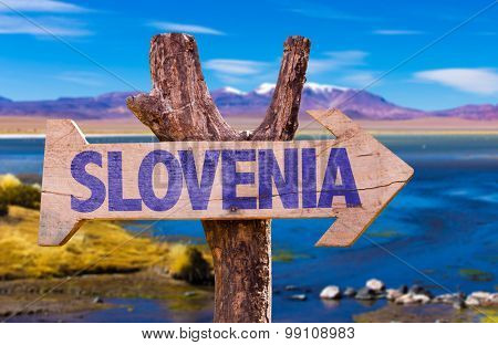 Slovenia wooden sign with river on background