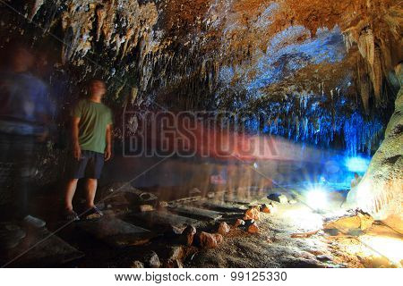 Blur moving of Tourist in the cave , Rachaburi, Thailand
