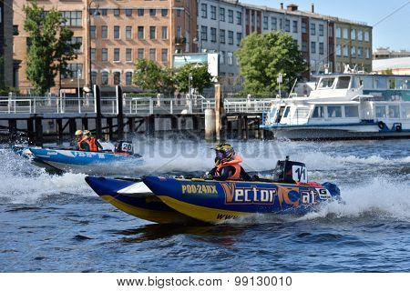 ST. PETERSBURG, RUSSIA - AUGUST 15, 2015: Unidentified riders go to the start of the River marathon Oreshek Fortress race. This international motorboat competitions is held since 2003