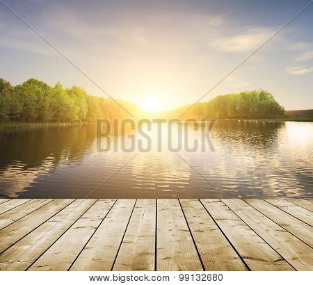 forest lake and wooden board background
