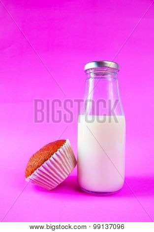 Banana Cake With Milk Bottle On Purple Background