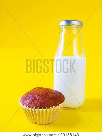 Banana Cake With Milk Bottle On Purple Background