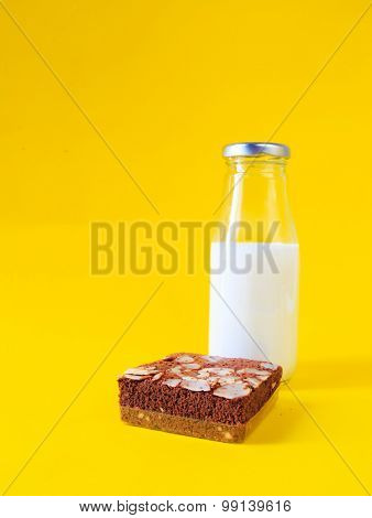 Banana Cake With Milk Bottle On Yellow Background