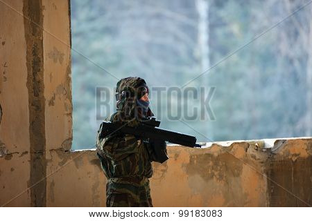 boys playing with gun during laser tag