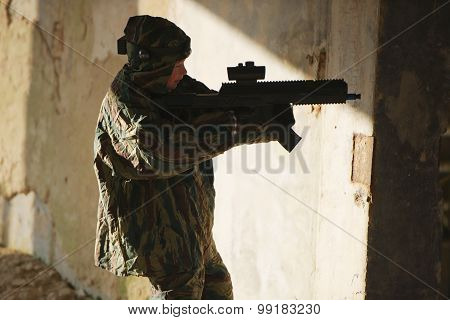boys playing with gun during laser tag