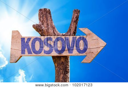 Kosovo wooden sign with sky background