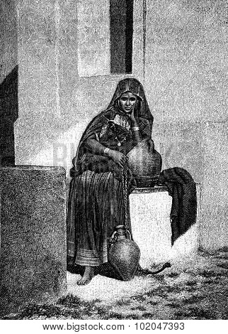 In Tunis. A water carrier, vintage engraved illustration. Journal des Voyages, Travel Journal, (1879-80).