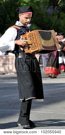 Musicians With The Traditional Costume Of Sardinia.