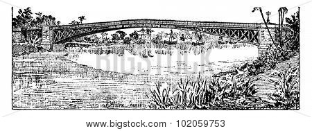 Bridge (arch) courier in Saigon, vintage engraved illustration. Industrial encyclopedia E.-O. Lami - 1875.