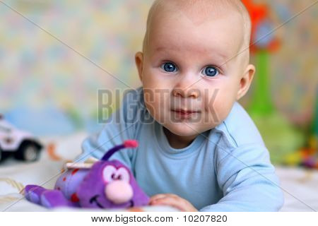 A child with his toys