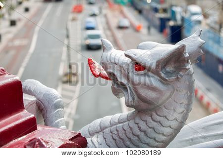 Holborn dragon close up and blurred view on the London road with ca