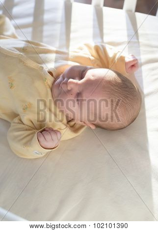 Baby In A Baby Bed