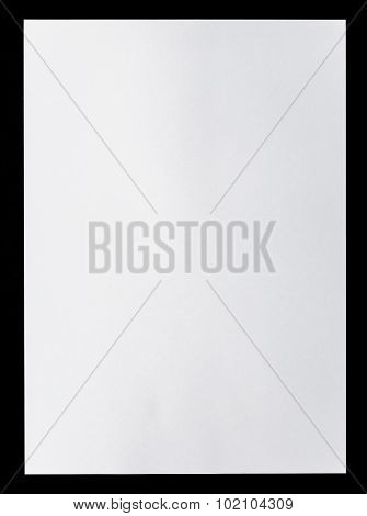 White Empty A4 Paper Isolated On Black