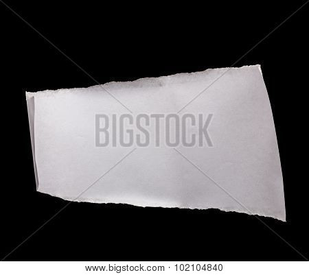 Piece Of White Paper Isolated On Black
