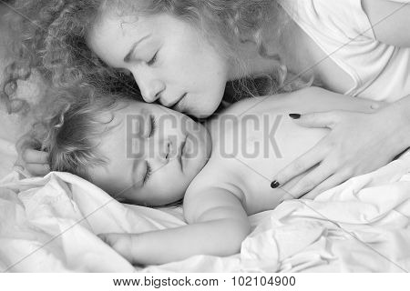 Mother Kissing Baby