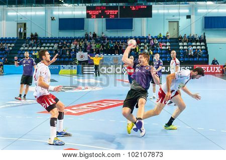 CHEKHOV, RUSSIA - SEPTEMBER 17: Young men playing handball on September 17, 2015 in Chekhov, Russia. Champions League. 