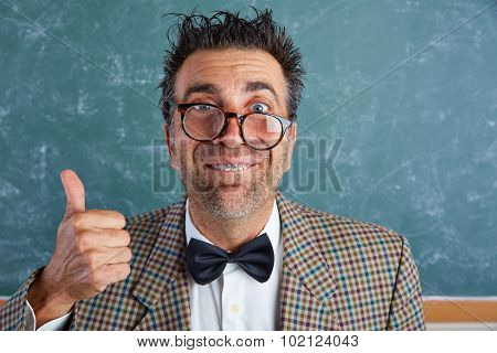 Nerd silly retro teacher man with braces funny expression ok thumb up gesture