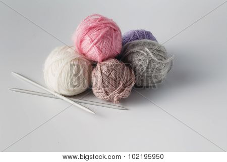 Clews Of Colored Yarn With Niddle