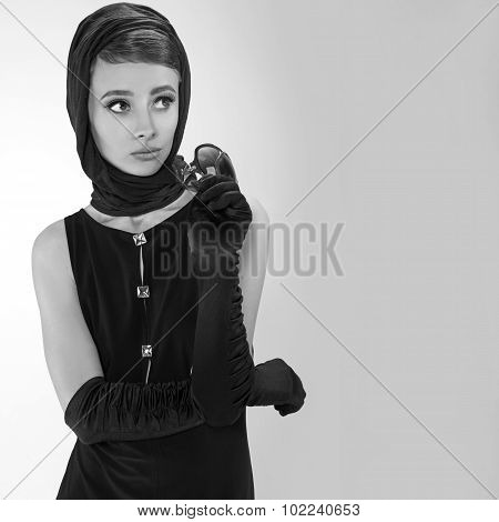portrait of beautiful young woman in retro style . copy space.