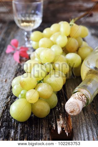Green Grapes And A Bottle Of White Wine