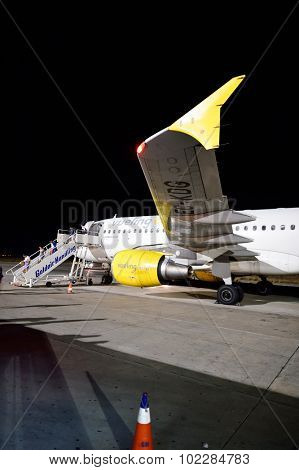 SANTORINI, GREECE - AUGUST 05, 2015: Vueling Airbus A320. Vueling Airlines, S.A. is a Spanish low-cost airline based at El Prat de Llobregat in Greater Barcelona