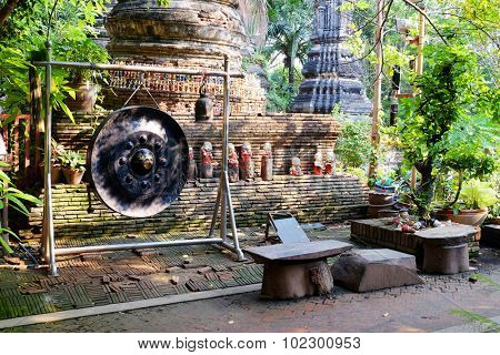 Ancient gong and bells in Buddhist temple in Ayutthaya Historical Park Thailand