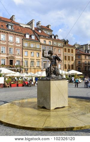WARSAW, POLAND - SEPTEMBER 16, 2015: Statue of Mermaid at Old Town Market Place on 16 September 2015 in Warsaw, Poland. Mermaid made by the sculptor Konstanty Hegel is the symbol of Warsaw.