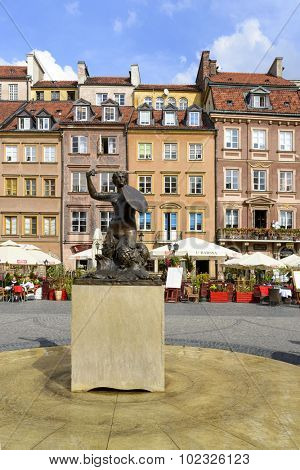 WARSAW, POLAND - SEPTEMBER 16, 2015: Statue of Mermaid at Old Town Market Place on 16 September 2015 in Warsaw, Poland. Mermaid made by the sculptor Konstanty Hegel is the symbol of Warsaw.