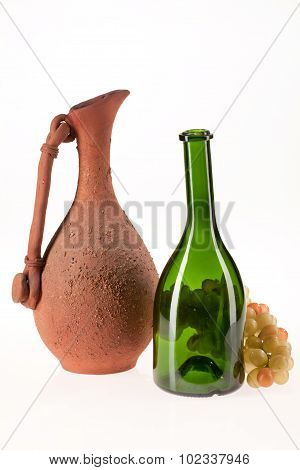 Pot, Bottle And Grape