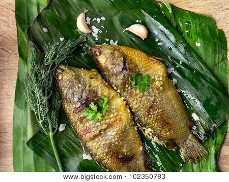 Delicious Grilled Fresh Fish On Dark Stone Background , Healthy Or Diet Food.