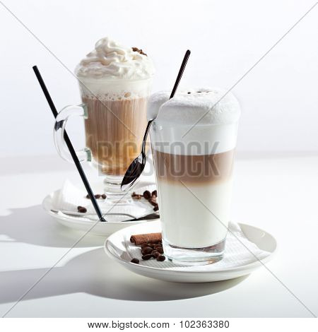 Coffee with Milk and Latte Macchiato Coffee over White