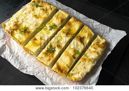 Pie of pita bread with cheese